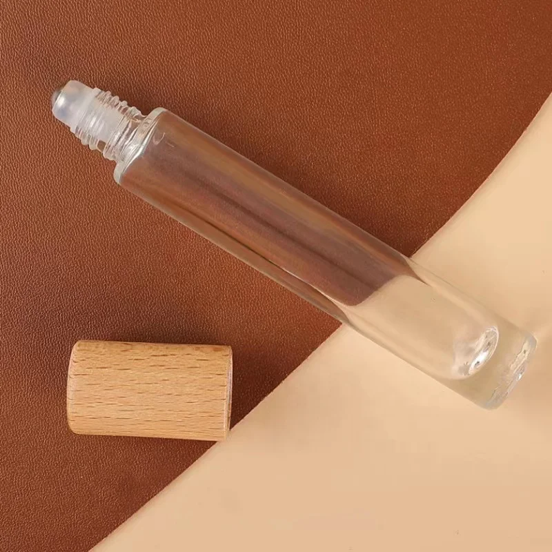 Clear glass essential oil roller bottles 10ml 15ml roller bottles for essential oils with wood cap