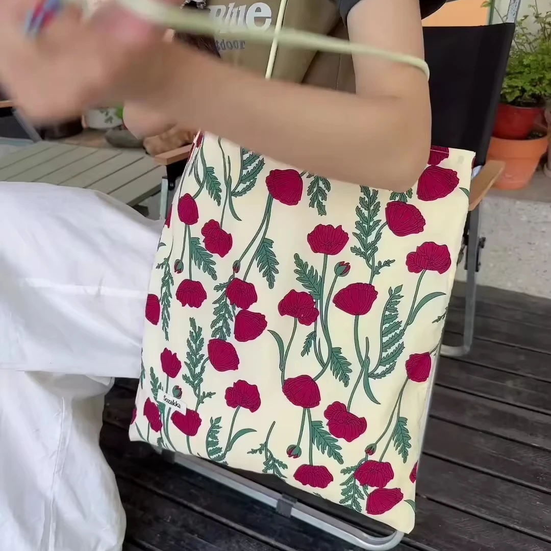 Korean style new floral canvas bag student retro large capacity play holiday tote bag shoulder bag