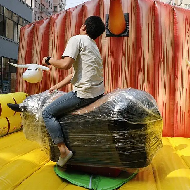 High quality commercial  rodeo bull inflatable bounce outdoor sports games Inflatable machine bull for sale