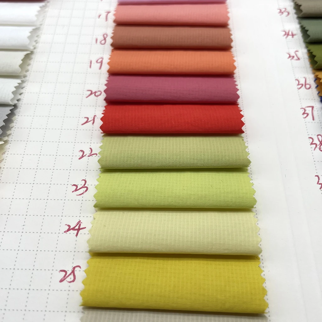 wholesale wrinkle 100% nylon 40D waxing checking ripstop fabric waterproof PU glue coating down jacket windproof fabric for coat