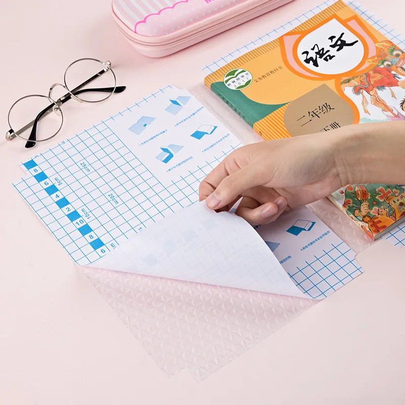 Cheap price size 50x36cm 80 microns transparent clear embossed pvc cpp self adhesive book cover