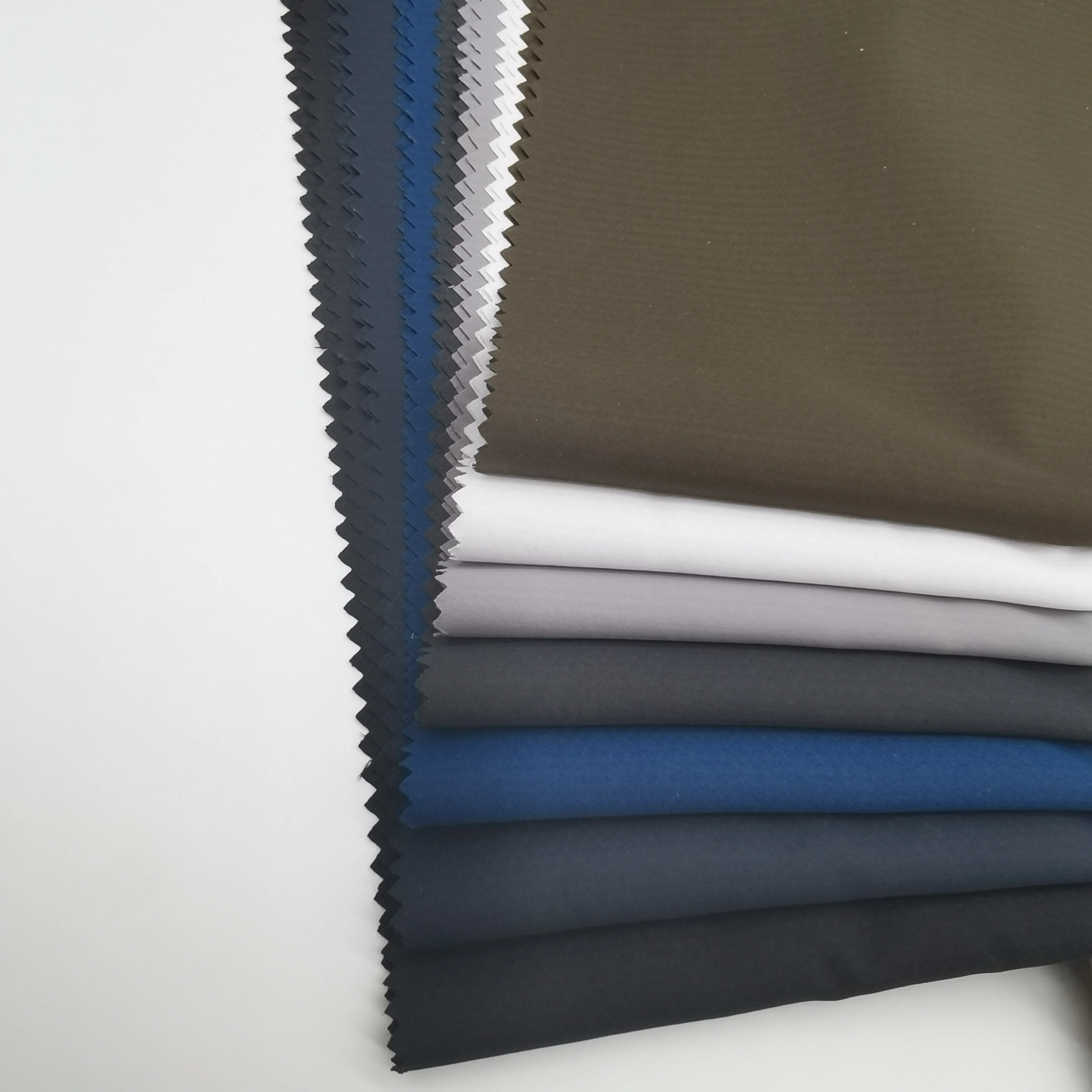 100% POLYESTER SANTANA BONDING  PONGEE  FABRIC FOR  WINTER JACKET