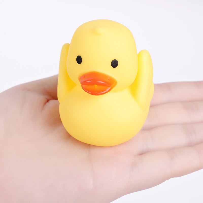 Drop shipping Baby Bath Toy Novelty Place Float and Squeak Rubber Duck Ducky for Kids