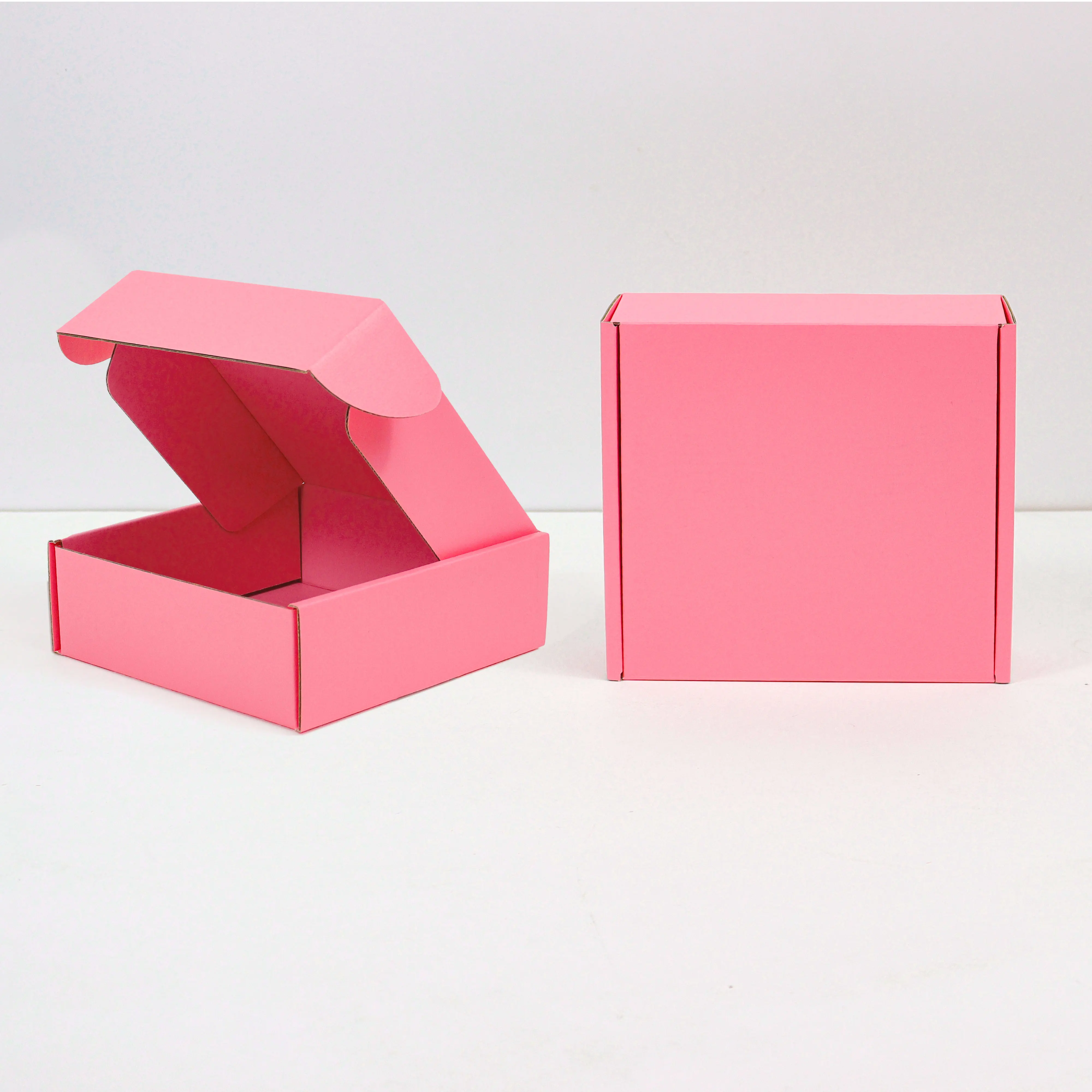Custom pink shipping boxes for small business with logo express mailer box corrugated cardboard box packaging for clothing