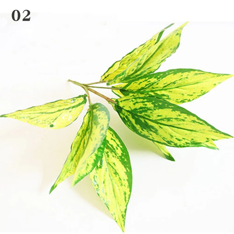 
2021 Artificial plant background wall plastic potted flower arrangement leaves wedding road guide fake flower plant pepper grass 