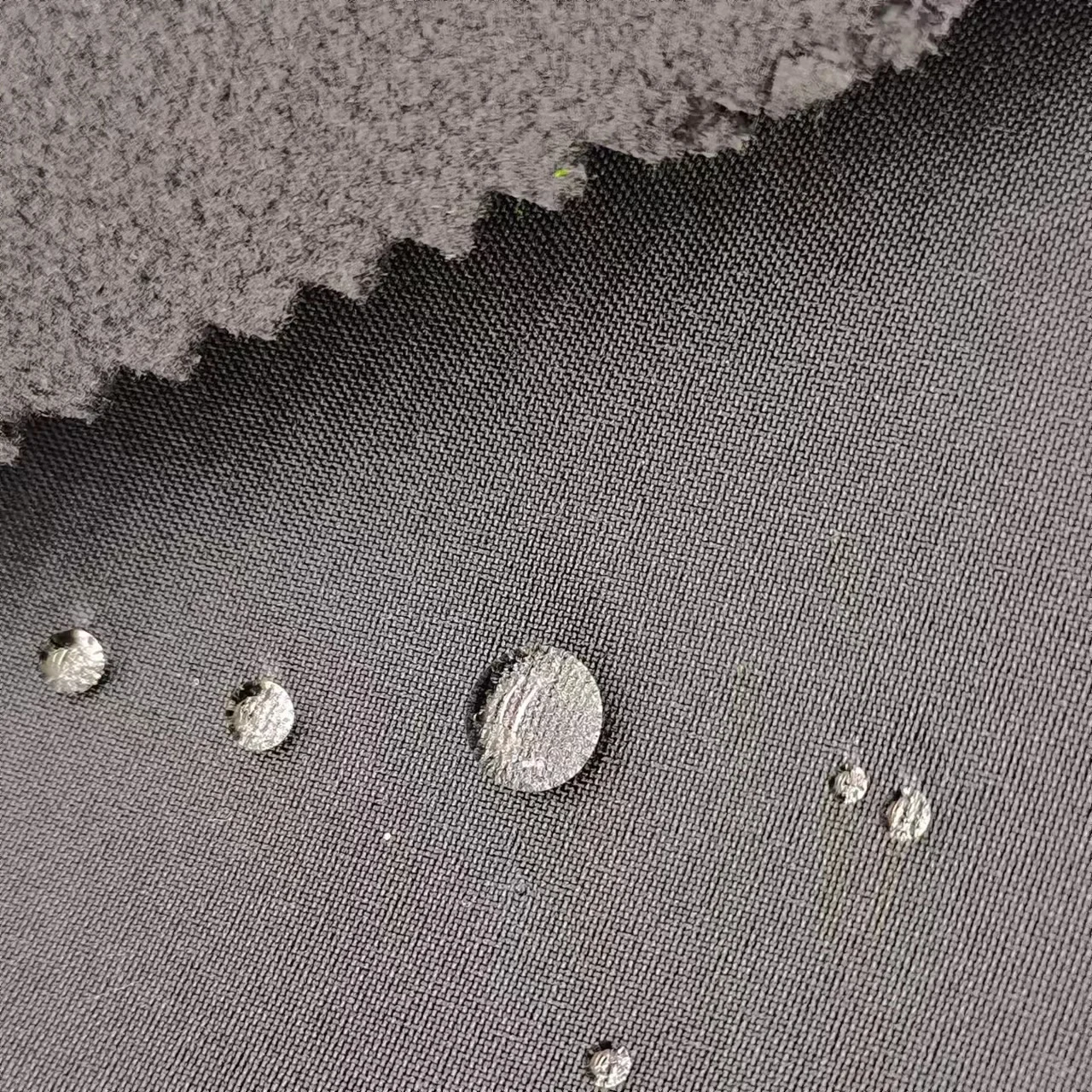 100% Polyester Softshell Plain Breathable Waterproof Windproof TPU Bonded Fleece 3 Layer Softshell Fabric For Jacket