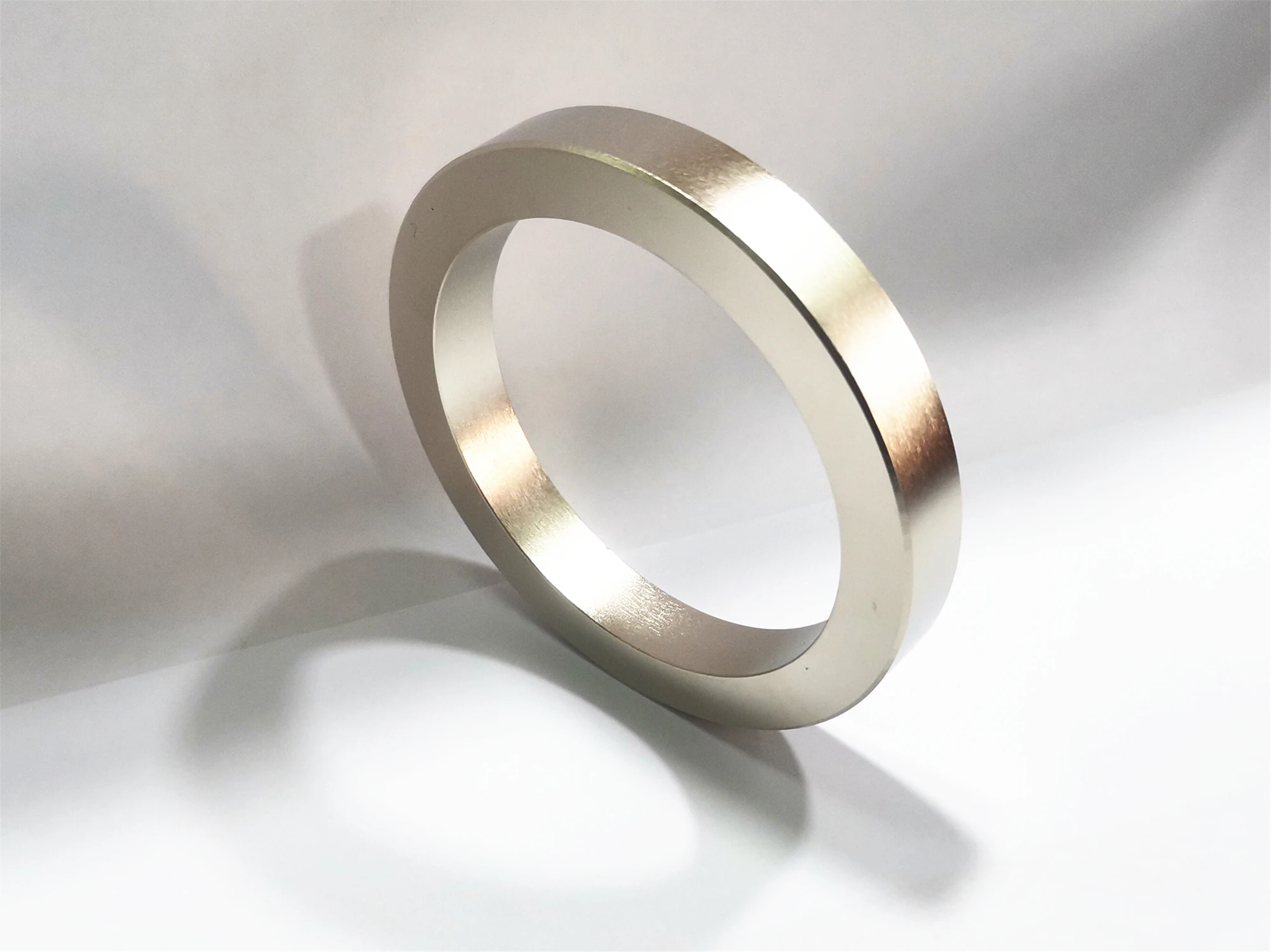 Radially oriented annular sintered neodymium rare earth permanent magnet ring magnet