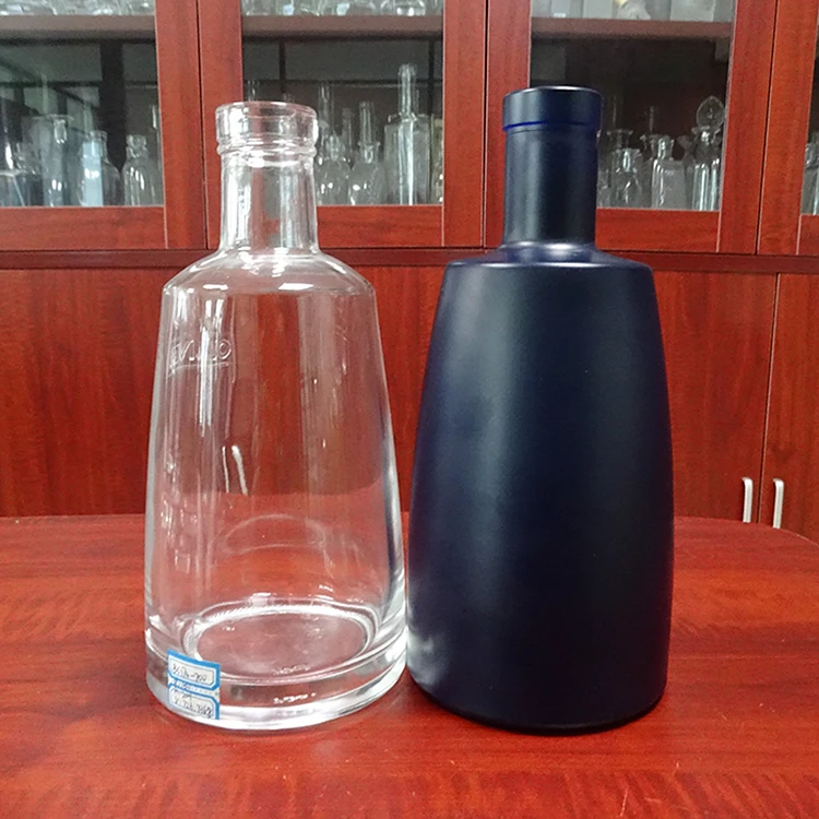 China Factory Sale Heavy Weight Cork Top Custom Label Blue Glass Whiskey Bottle 700ml