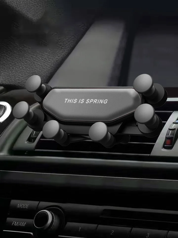 A car gravity mobile phone bracket new car air outlet bracket car gift fixed mobile phone bracket manufacturer