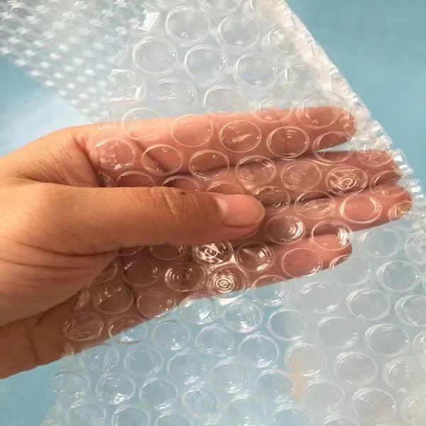 Bubble machine and air bubble film wrap roll and bubble film air packing film making machine