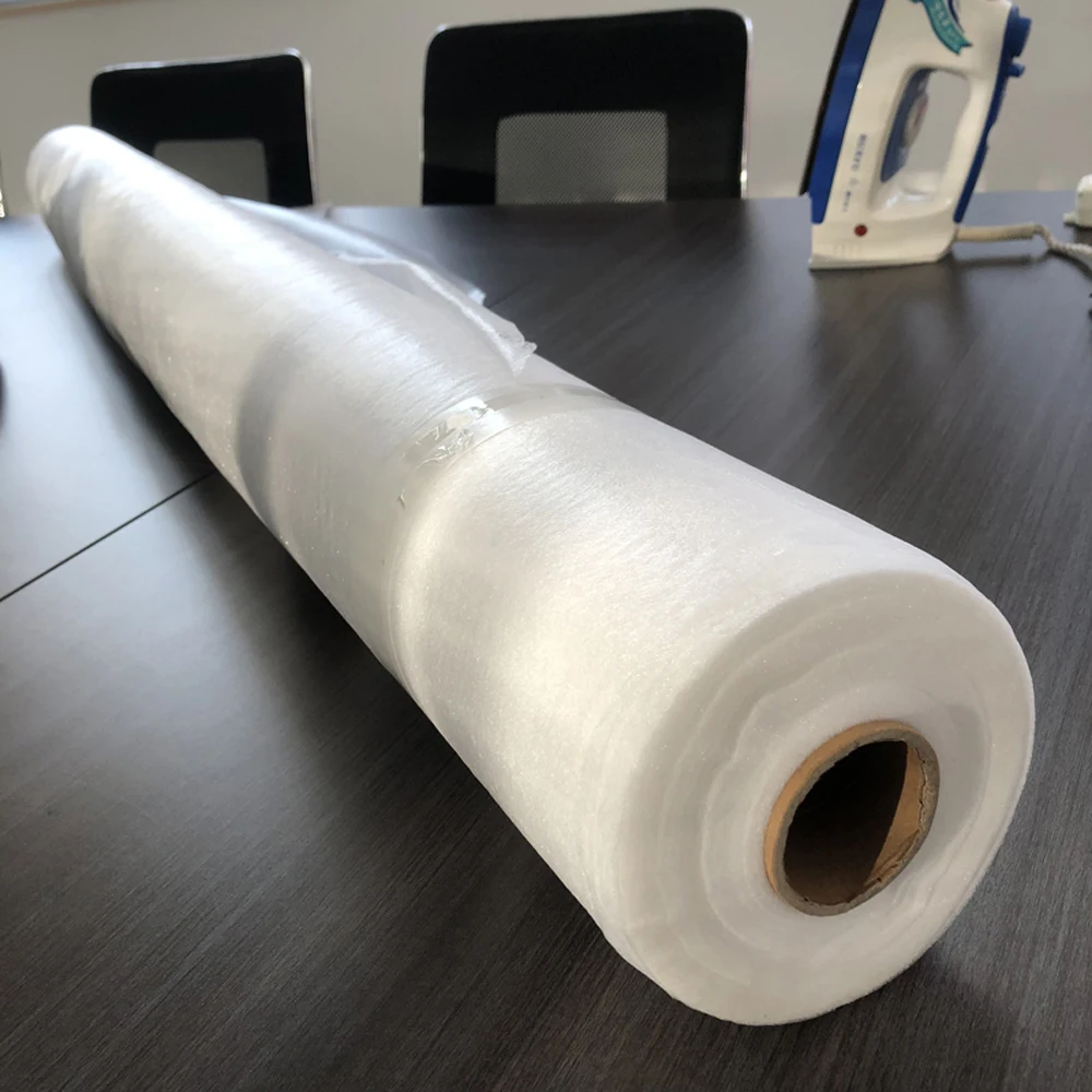Hot melt adhesive web used for bonding fabrics together