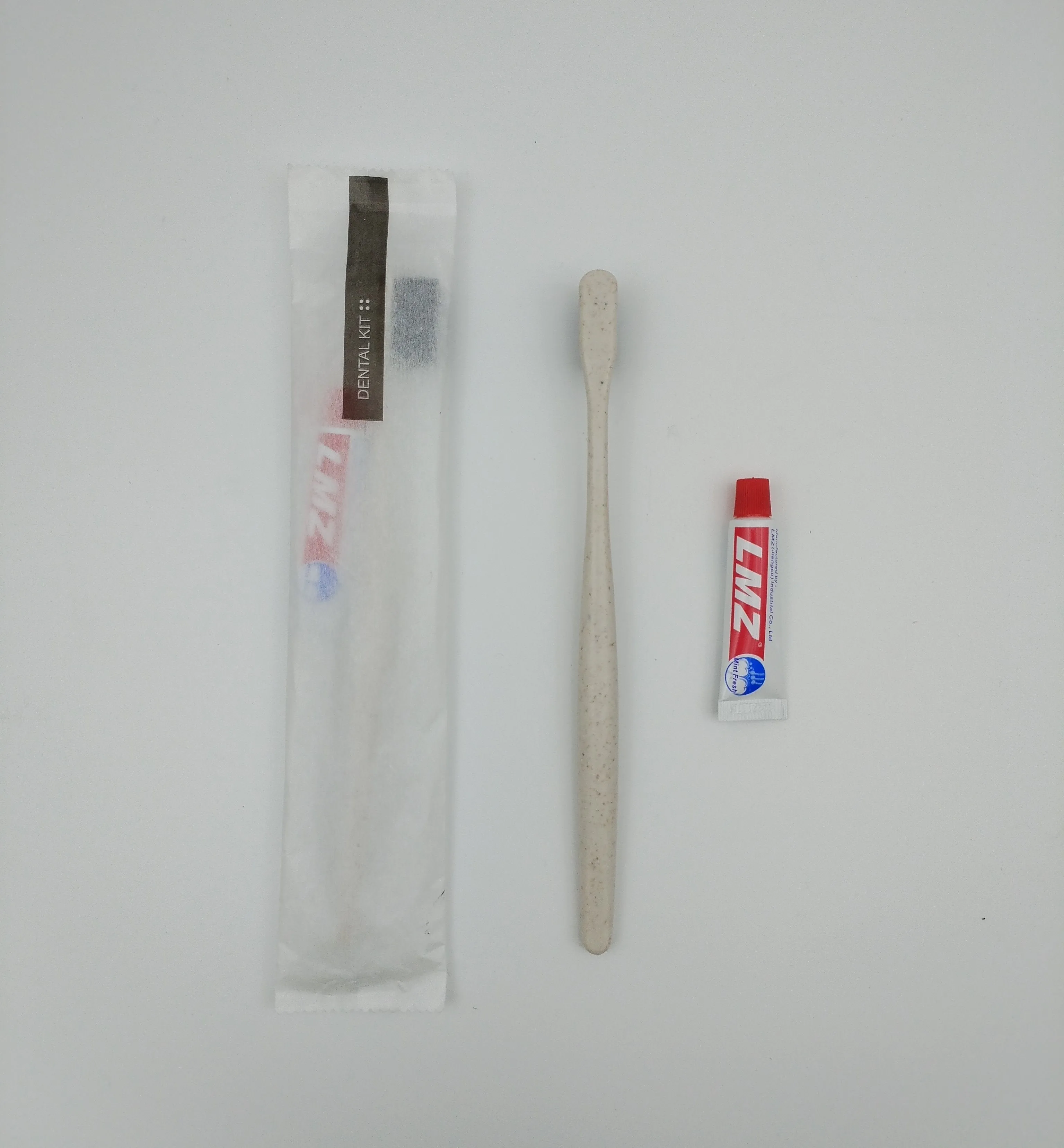 Dubai Hotel Dry Amenities Disposable Dental Kit with Waterproof Paper Packing Hotel Toothbrush with LMZ Toothpaste-In Stock