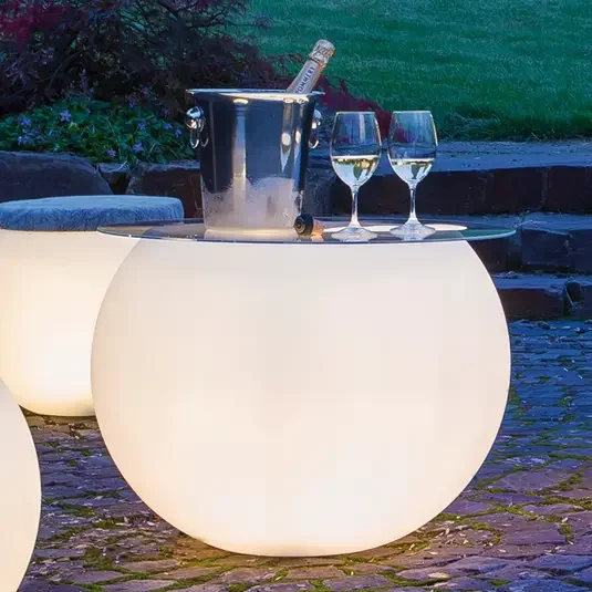 LED plastic glowing colored coffee with led lights bar illuminated outdoor table