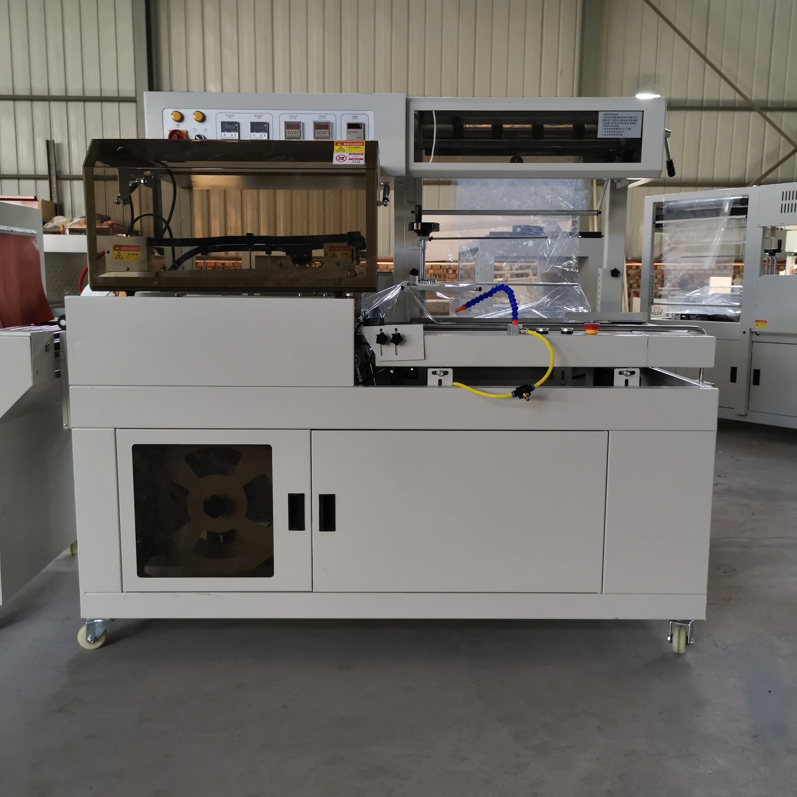 Automatic Side Sealing Cutting Machine Cosmetics Ear Phone Boxes Book Food Shoes Shrink Film Wrapping Packaging Machine