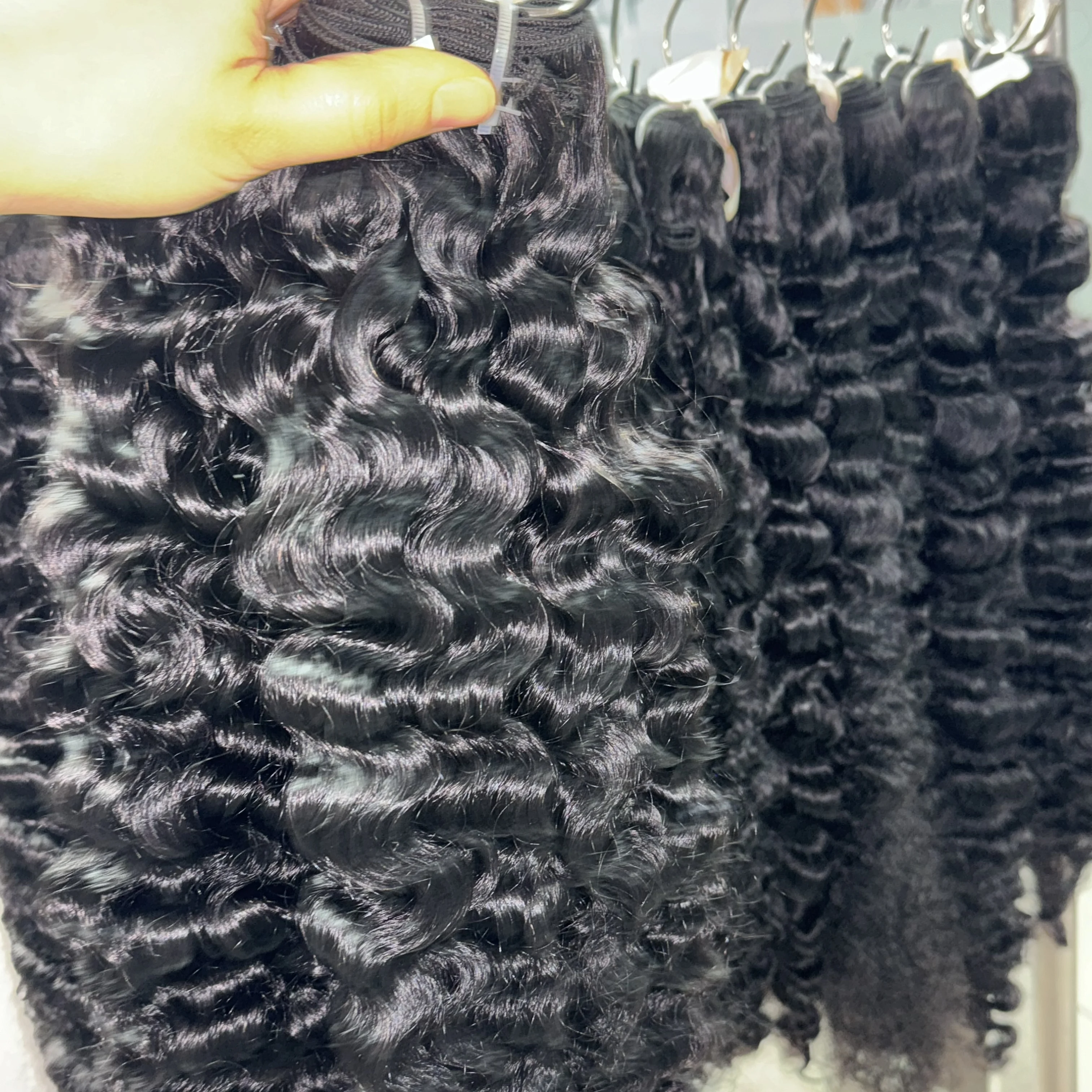 Wholesale curly hair raw straight hair human hair weaves for sale