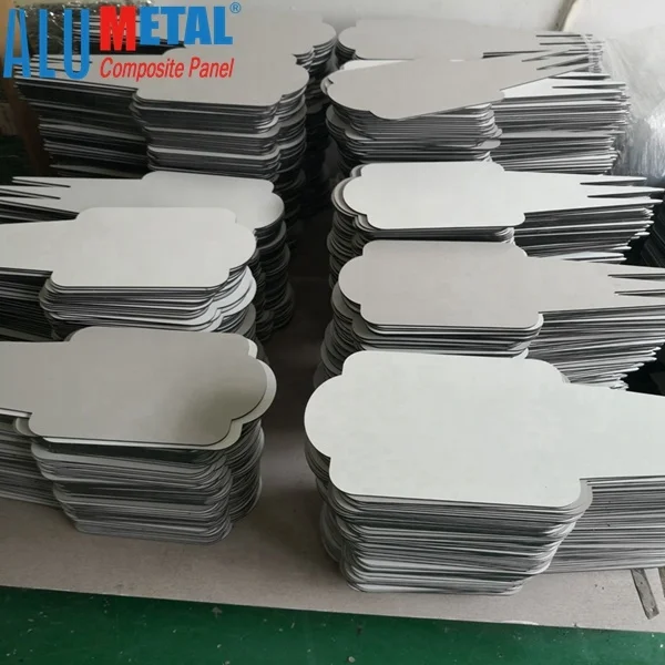 cnc router cutting on  ACP sheet  for  custom design metal die cut in the sign industry