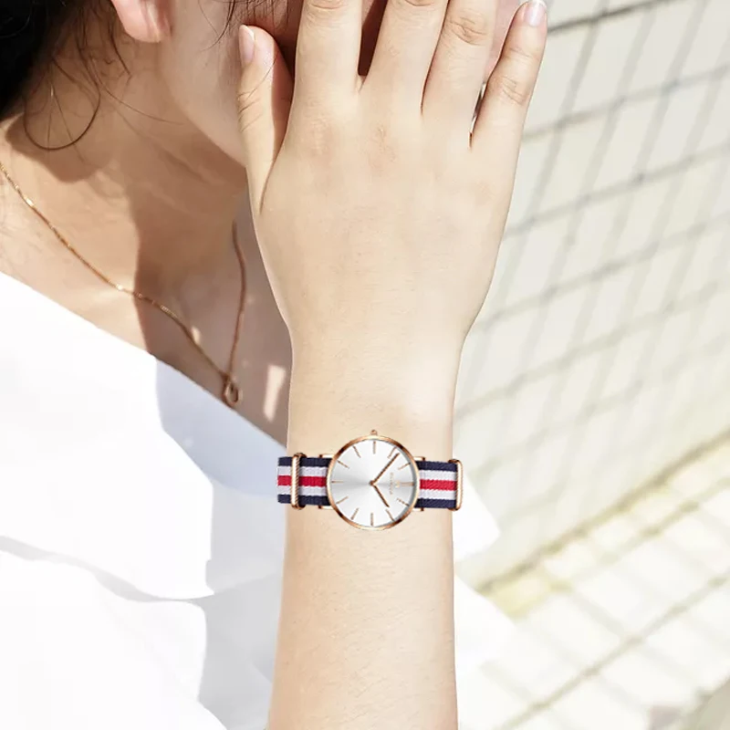 China factory price Strap changeable Lady Wrist Waterproof Man Vogue Steel Luxury Simple Quartz Watch