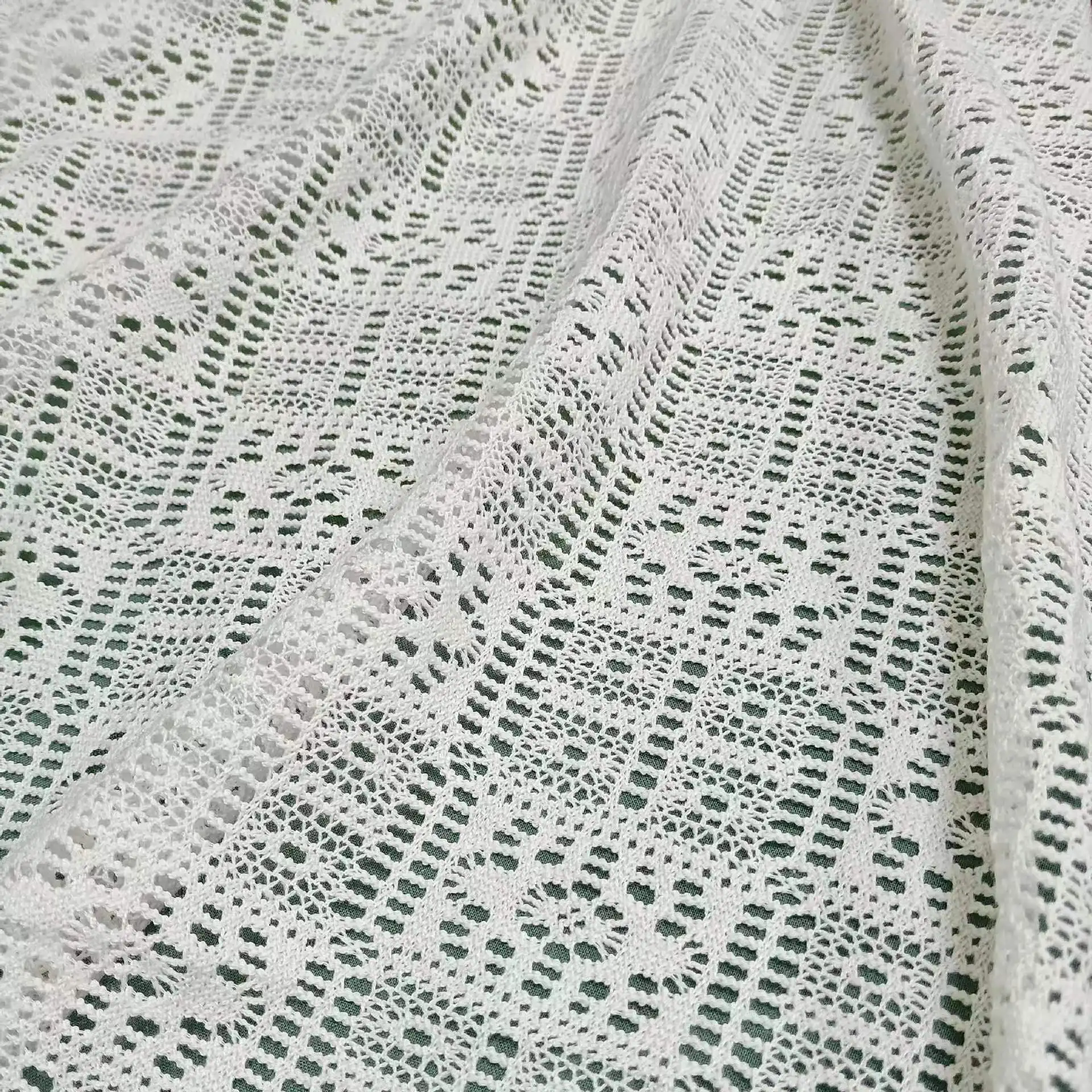 wave pattern crochet knitted fabric 3D jacquard swimwear fabric hollow breathable polyester fabrics for clothing women