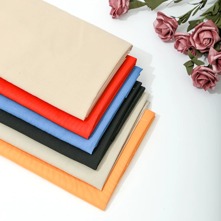 China suppliers polycotton T/C 65/35 45*45 110*76 100gsm 57/58' polyester cotton calico fabric rolls for clothing pocketing lin