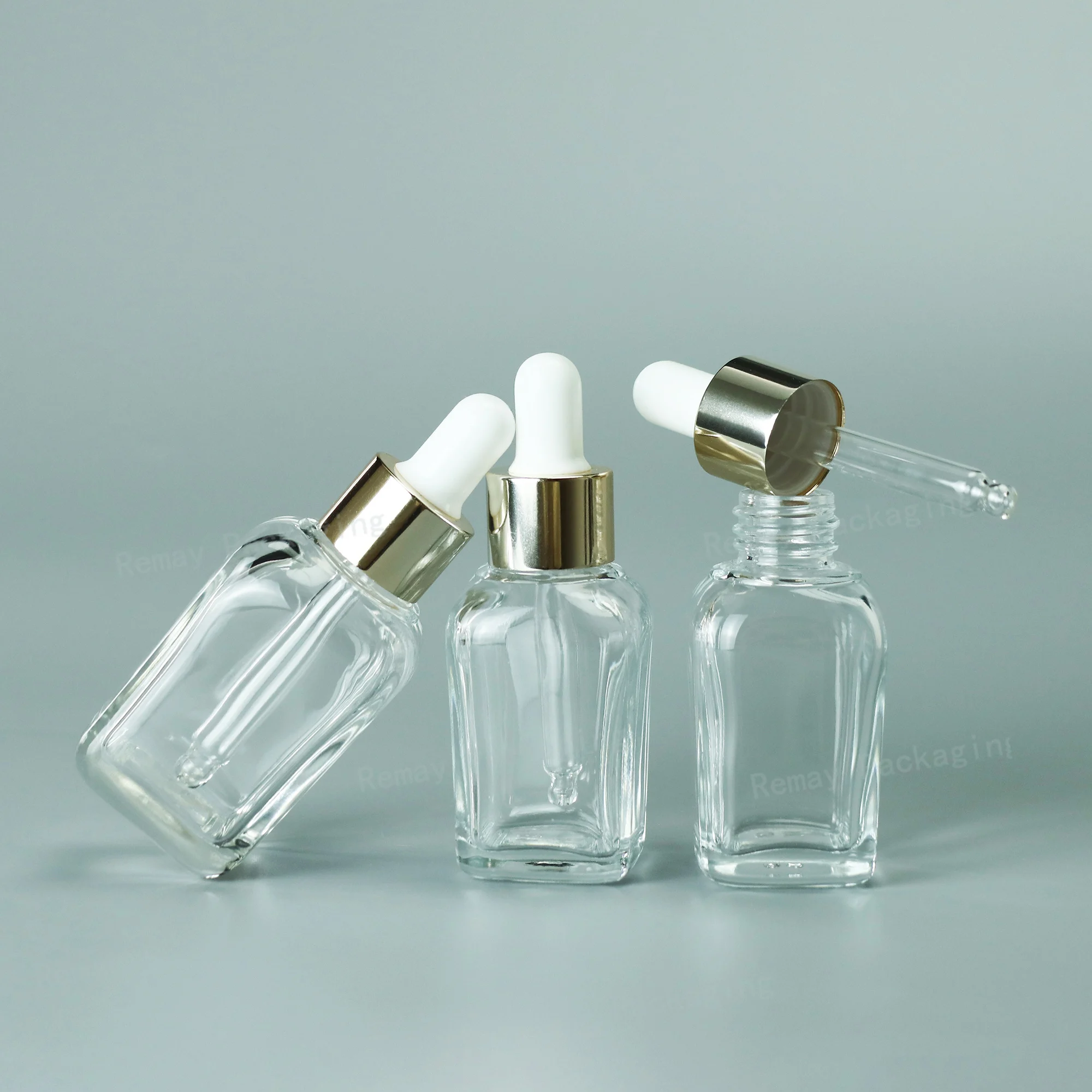 Customized clear square glass essential oil dropper bottle 30ml cosmetic pipette serum bottles with gold dropper cap in stock