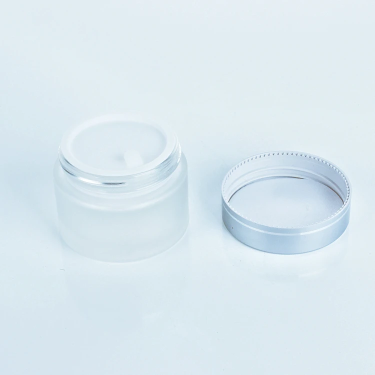 Empty glass jar with silver cover for stock Cream 50ml 100ml frosted empty glass frosting cans cosmetic packaging