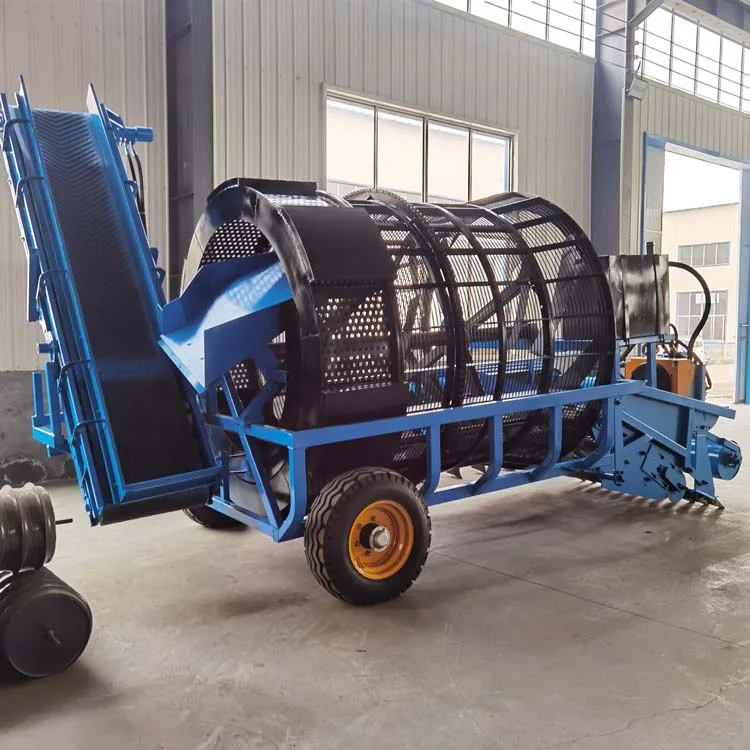 Large stone picker machine collect and recycle debris and clear land and open up wasteland