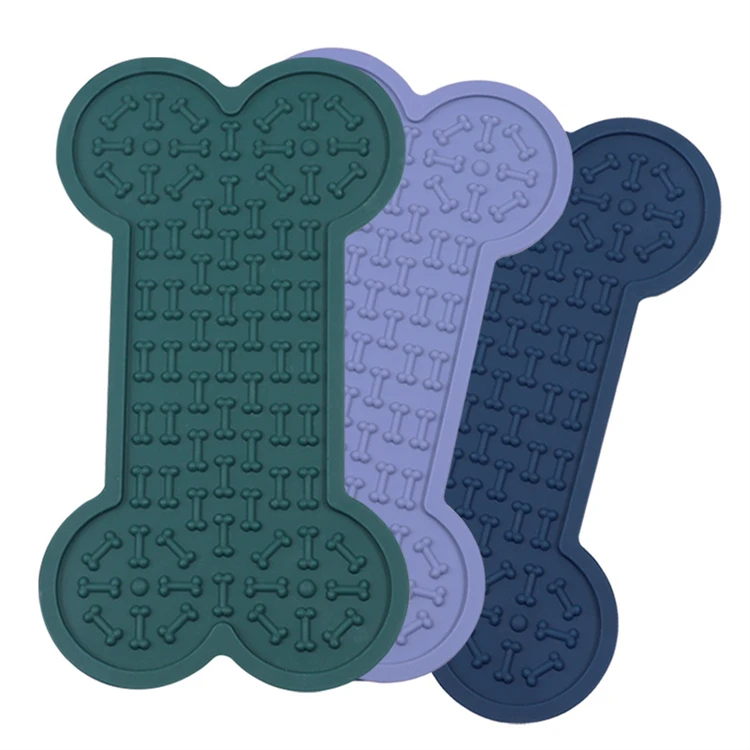 New Product Ideas 2023 Silicone Slow Eating Dog Lick Pad with Suction to Wall bone shape lick mat Mat Bowl for Pet Products