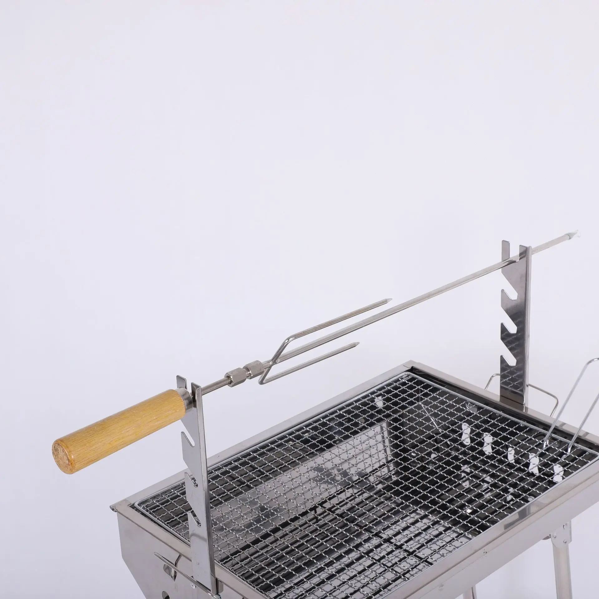 Manufacturers wholesale BBQ grill stainless steel outdoor portable folding barbecue grill rotating charcoal grill