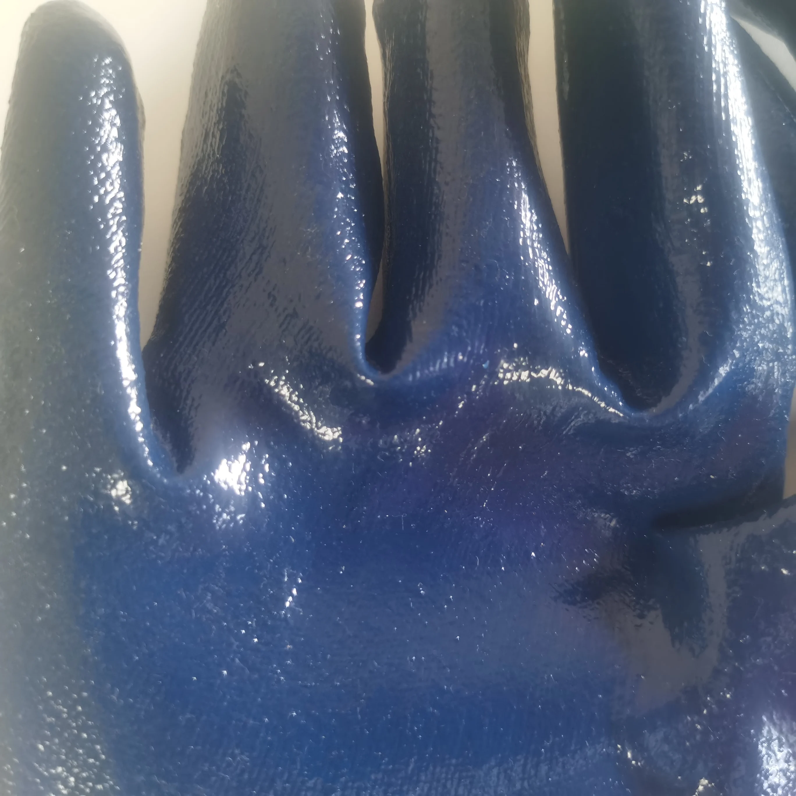
bule nitrile coated with jersey liner smooth finish with knit wrist gloves 