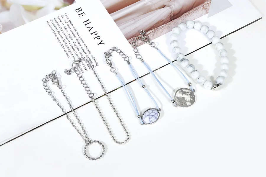 
Korean Fashion Oval crack pine stone bead chain map hollow ring bracelet set of five pieces creative marble hand rope 