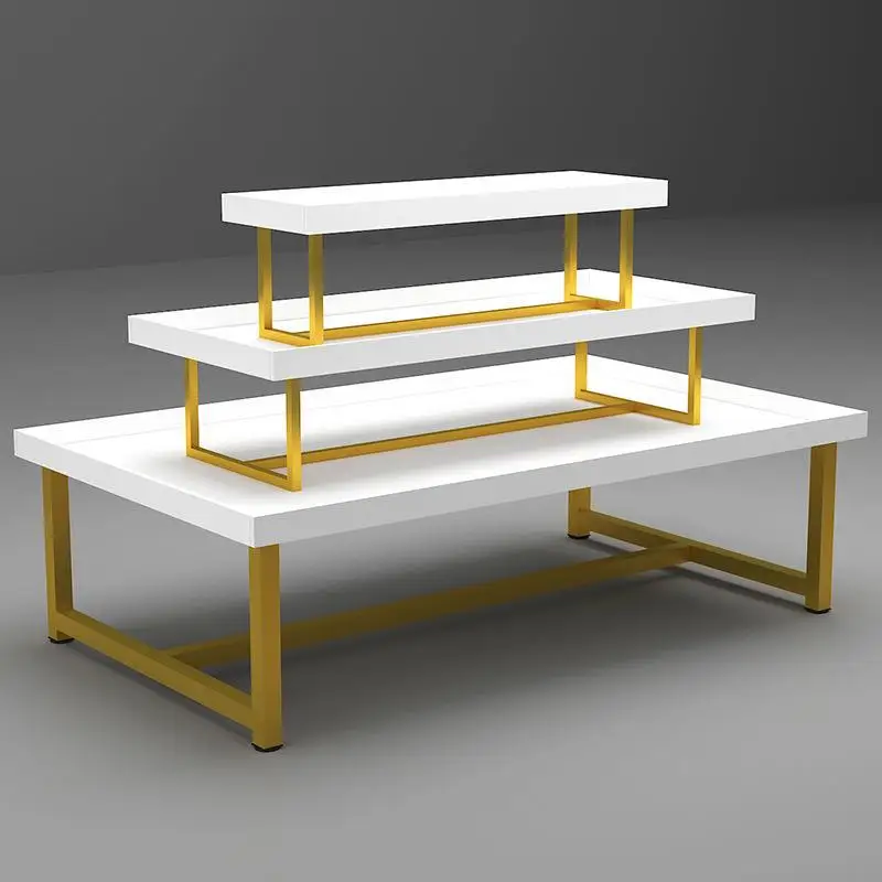 Custom Boutique Gold Clothing Wall Mounted Rack Nesting Table Clothes Shelving Garment Display Rack Clothing Store Furniture