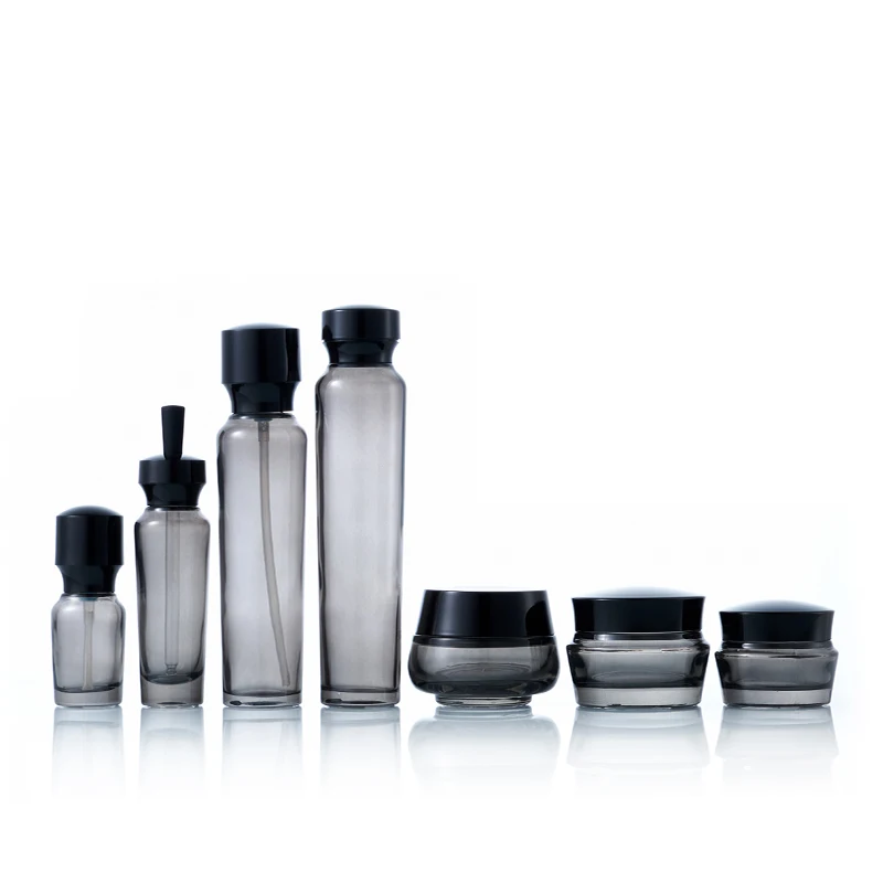 Chinese Manufacturer New Design Shape Glass Bottle And Cream Jars Empty Luxury Black Lotion Glass Bottles For Skin Care