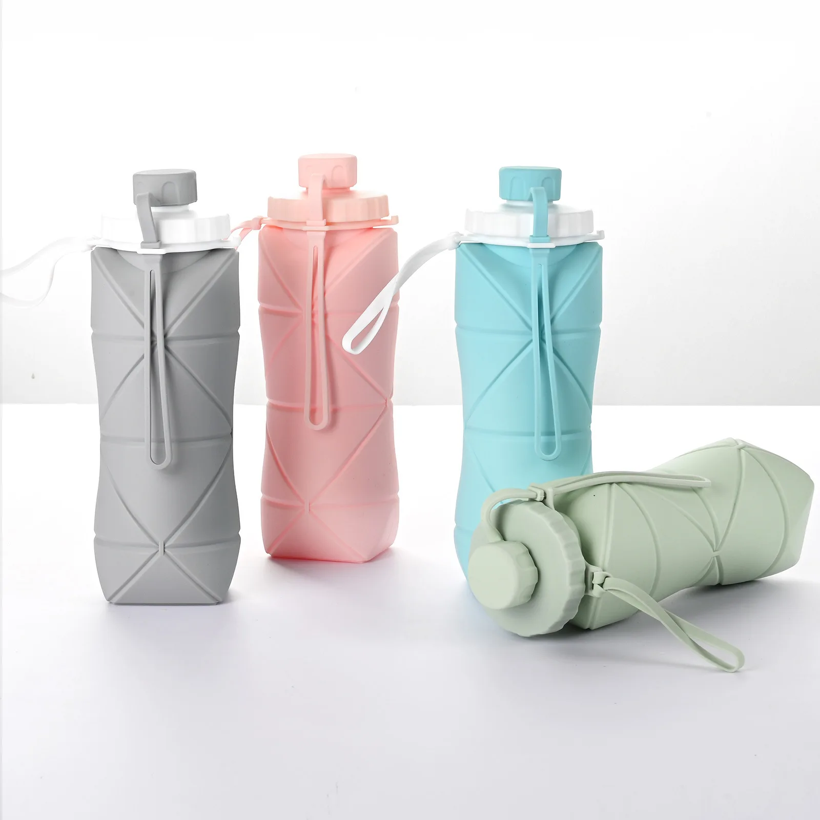 SUXIU OEM Folding water bottles for easy storage for camping Small space for custom water bottles logo Flat water bottles