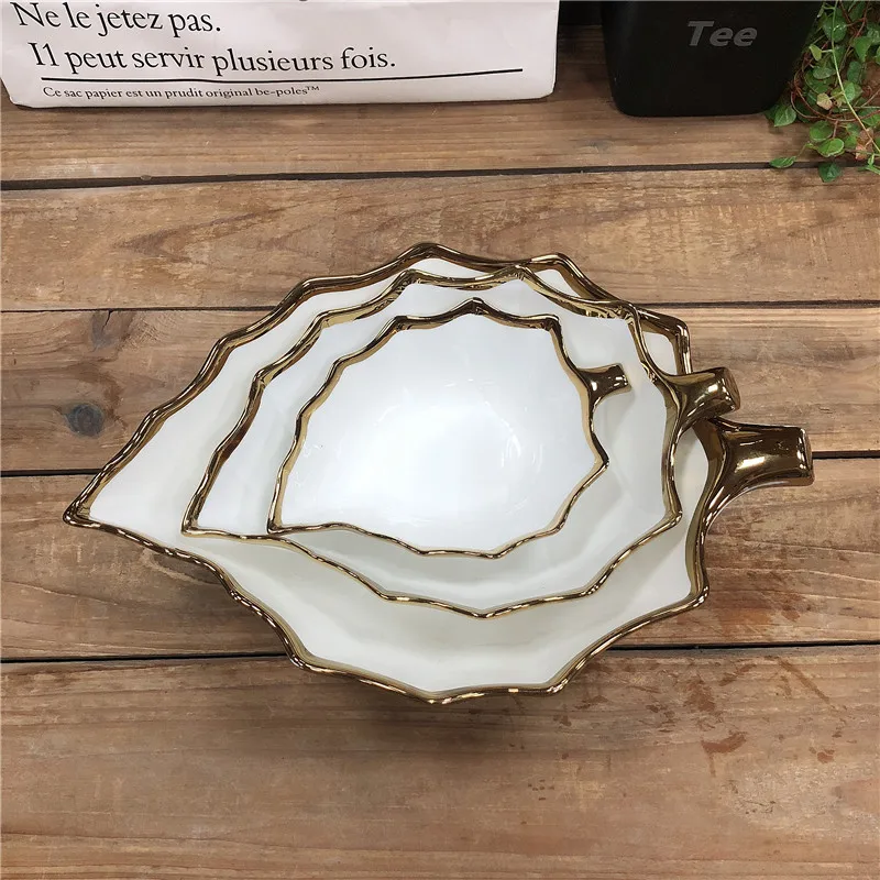 factory custom design leaf shape ceramic bowls with electroplate gold rim decoration for sale
