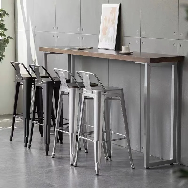 Modern industrial style metal bar stools durable and customizable high legged bar chairs for restaurants and cafes