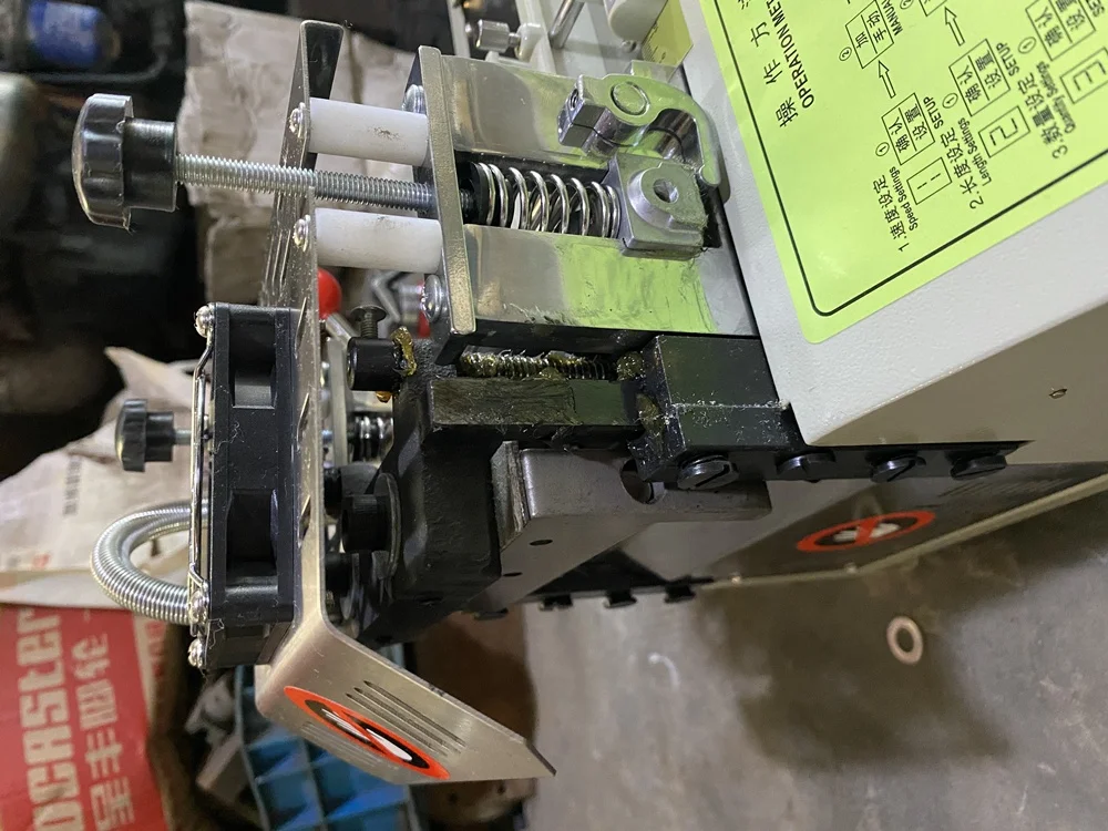 JK-110LR automatic electric webbing tape roll cutting machine leather belt ribbon conveyor strip rotary strap ribbon