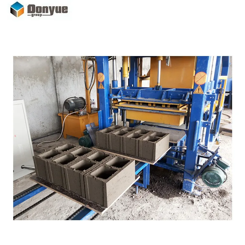 China Fully Automatic Hydraulic Interlocking Concrete Cement Hollow Block Making Machine QT4-15 Fly Ash Brick Making Machinery