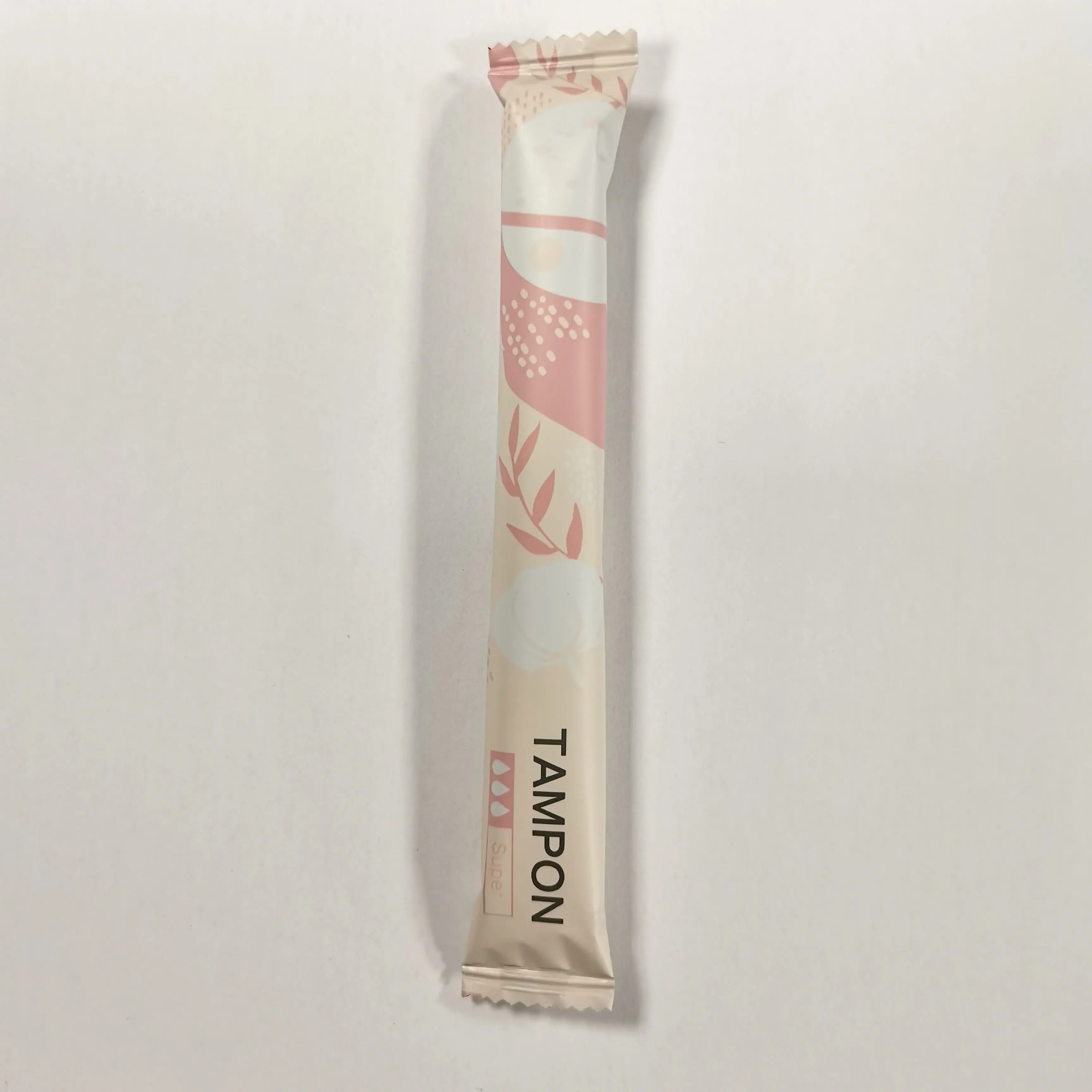 Disposable cotton tampons with plastic applicator