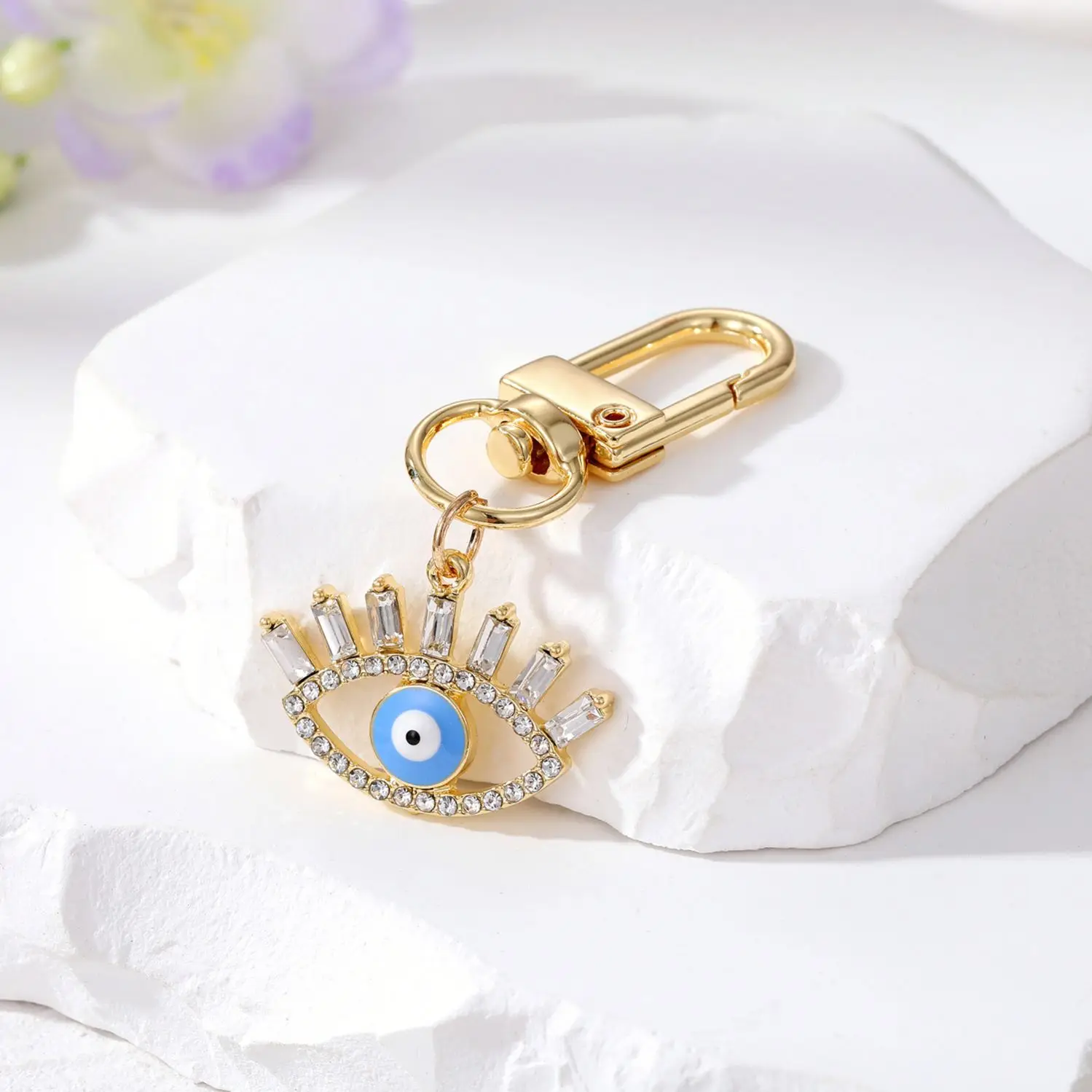 Cross-border e-commerce ornament hollow diamond eyelash eye keychain alloy geometric oil dripping Devil eye ornaments