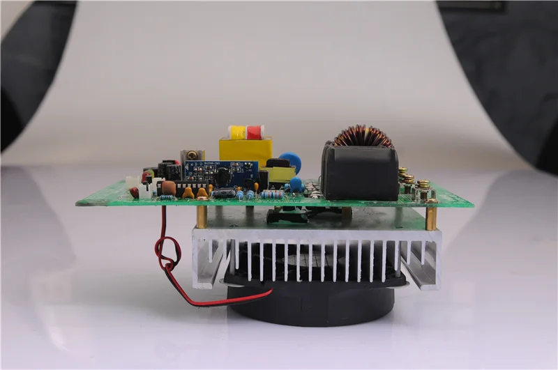 Induction heater connects coils to heat the plastic extruder