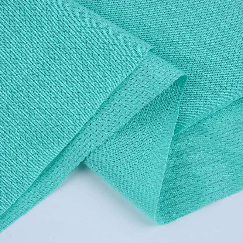 High stretch needle eye mesh fabric warp knitted polyester fabric Mesh fabric 140g autumn and winter sports cycling clothing fab