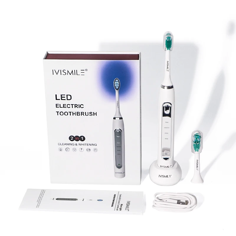 Электрическая зубная щетка для