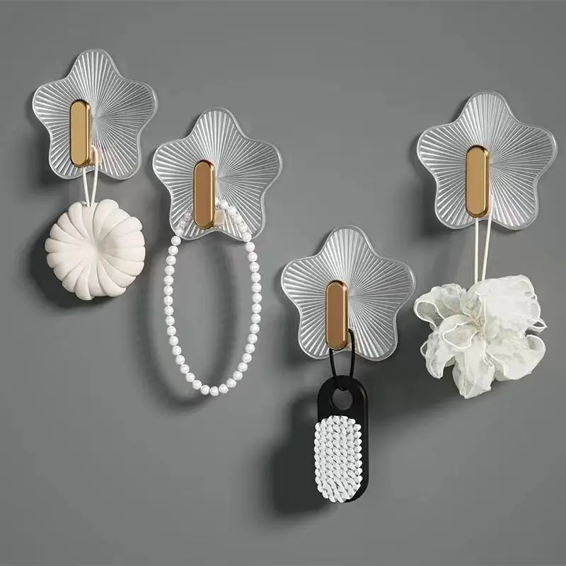 China Cheap Light Luxury ABS Self adhesive hook Transparent Gold Wall Luxury Hook Traceless Sticky Wall Hook