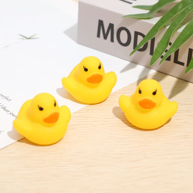 Hot new Bath Toy Animals Swimming Water Toys Mini Colorful Soft Floating Rubber Duck Squeeze Sound Funny Gift WCW518