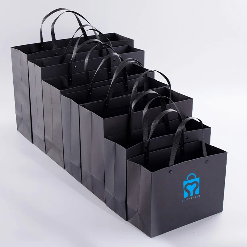 Custom clothing shoes cosmetics Shopping gift jewelry paper luxury packaging paper gift bags with handle your own logo