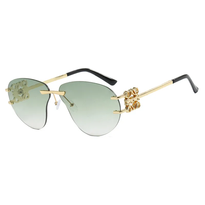 New fashion classic frameless beach uv400 high appearance level luxury sunscreen sunglasses high-end
