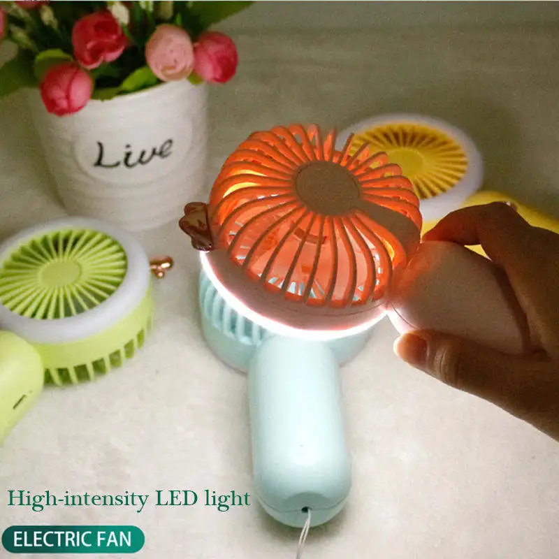 In stock Summer Small Pocket Cartoon Mini Fan Portable handheld Fan Cartoon Silent Night Light Mini Led Fan For Outdoor