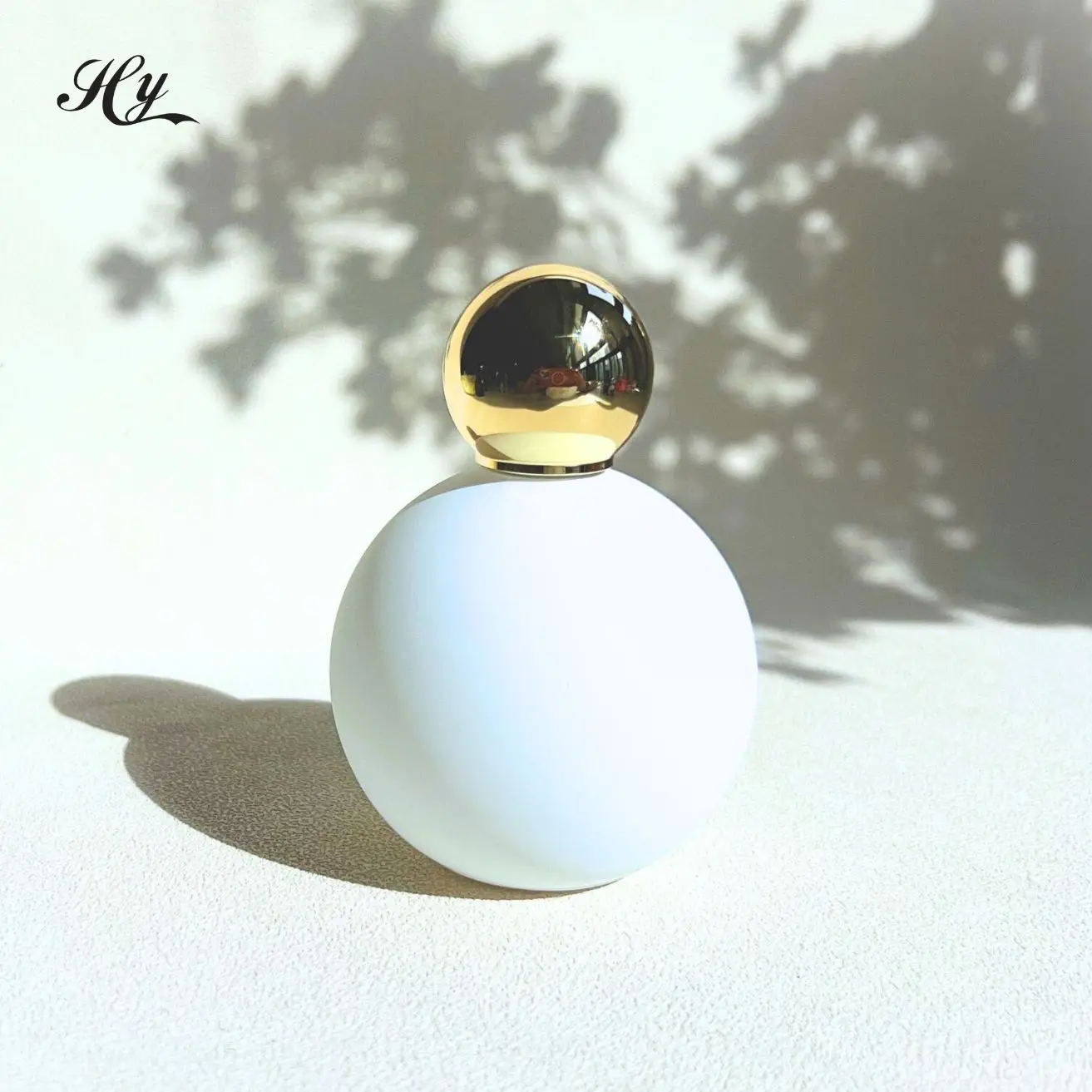 2024 New Arrival Unique mini design perfume bottles custom white cute perfume bottles Spherical Arabic Style Perfume Bottle