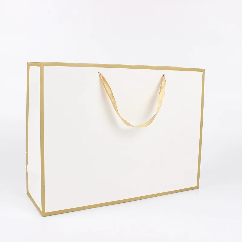 Custom luxury white cardboard waterproof and oil proof style competitive price kraft paper bags christmas small paper bags