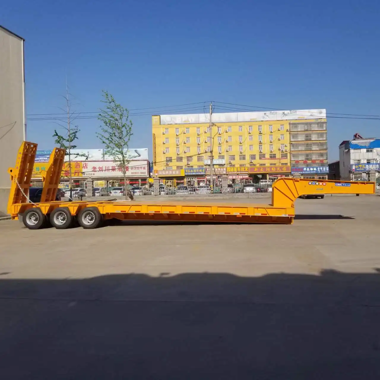 Best Selling 2 Axles 40FT 3 Axle 30 ton flat bed 50 ft tandem bogie 20ft 40ft 60ft low flatbed container semi trailer